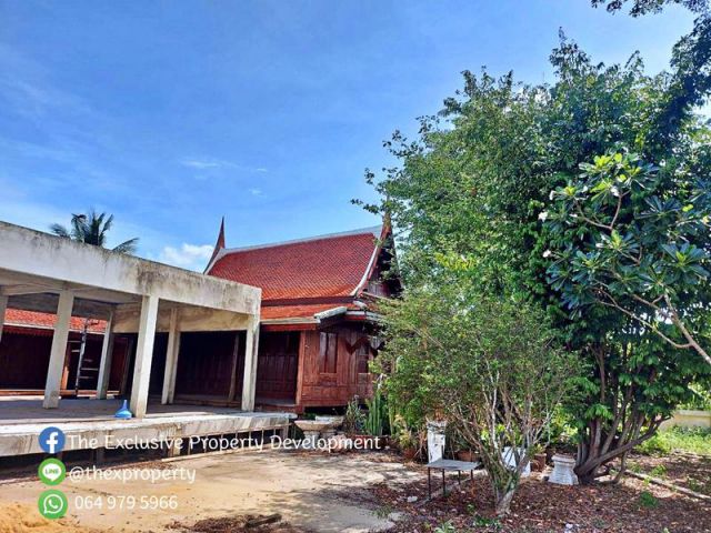 ขายบ้านเรือนไทย 2 หลัง เนื้อที่เกือบ 2 ไร่ ธรรมชาติร่มรื่น ด้านหลังติดริมน้ำ คลอง23 องครักษ์ นครนายก