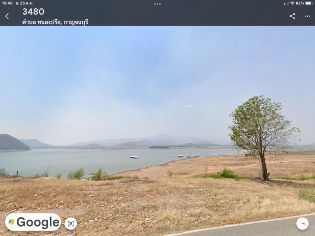 ขายที่ดิน50ไร่นส.3ธรรมดาครุฑดำ ติดถนนราดยางริมอ่างเก็บน้ำเขื่อนกระพร้อย ยาว1กิโลเมตร  ขายเพียงไร่ละ3.5แสน วิวภูเขาโดยรอบ