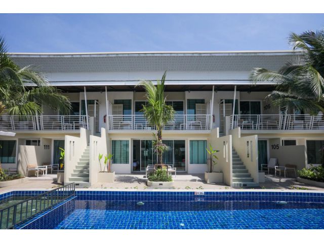 This is a hotel in Phuket with 40 rooms (38 Deluxe, 2 Suites), 2 swimming pools, a spa, a fitness center, a reception ar