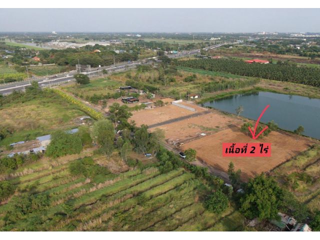 ที่ดินถมแล้วเลียบมอเตอร์เวย์ คลองสี่ ไฟฟ้า ประปาพร้อม ทำที่พัก โกดัง