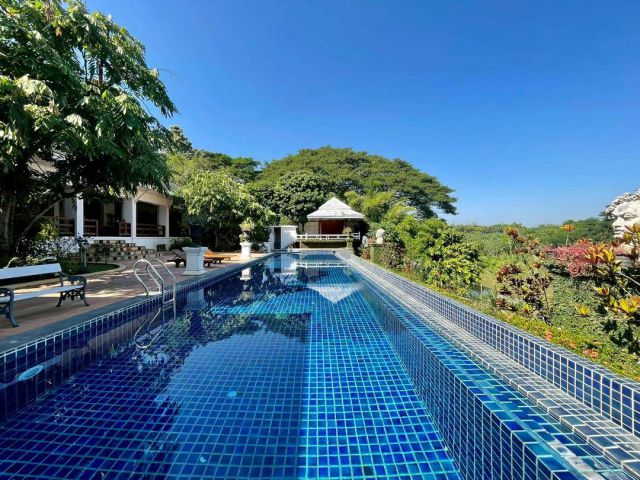 ขายบ้านพักตากอากาศสุดหรู สไตล์รีสอร์ตส่วนตัว   คฤหาสน์ไม้สักทองหลังใหญ่ พร้อมสระว่ายน้ำ ติดแม่น้ำปิง  ทำเลดอนแก้ว แม่ริม